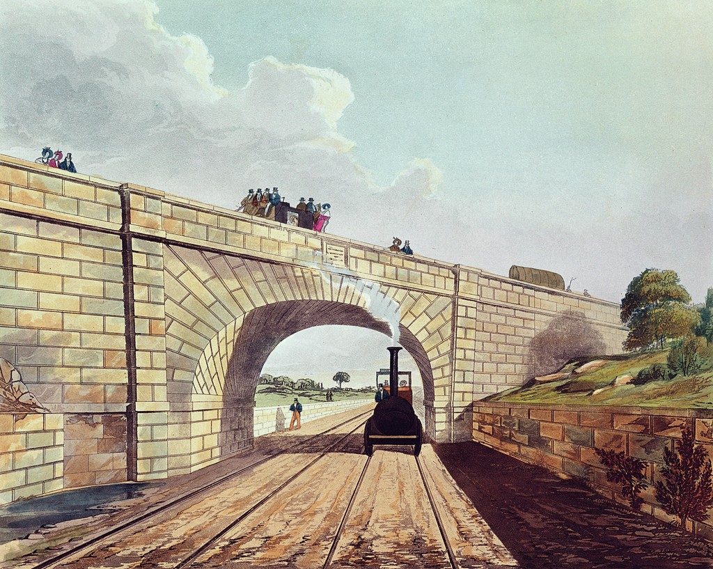 Hand-coloured 1831 print of an early steam train passing under the skew bridge at Rainhill on the Liverpool and Manchester Railway.